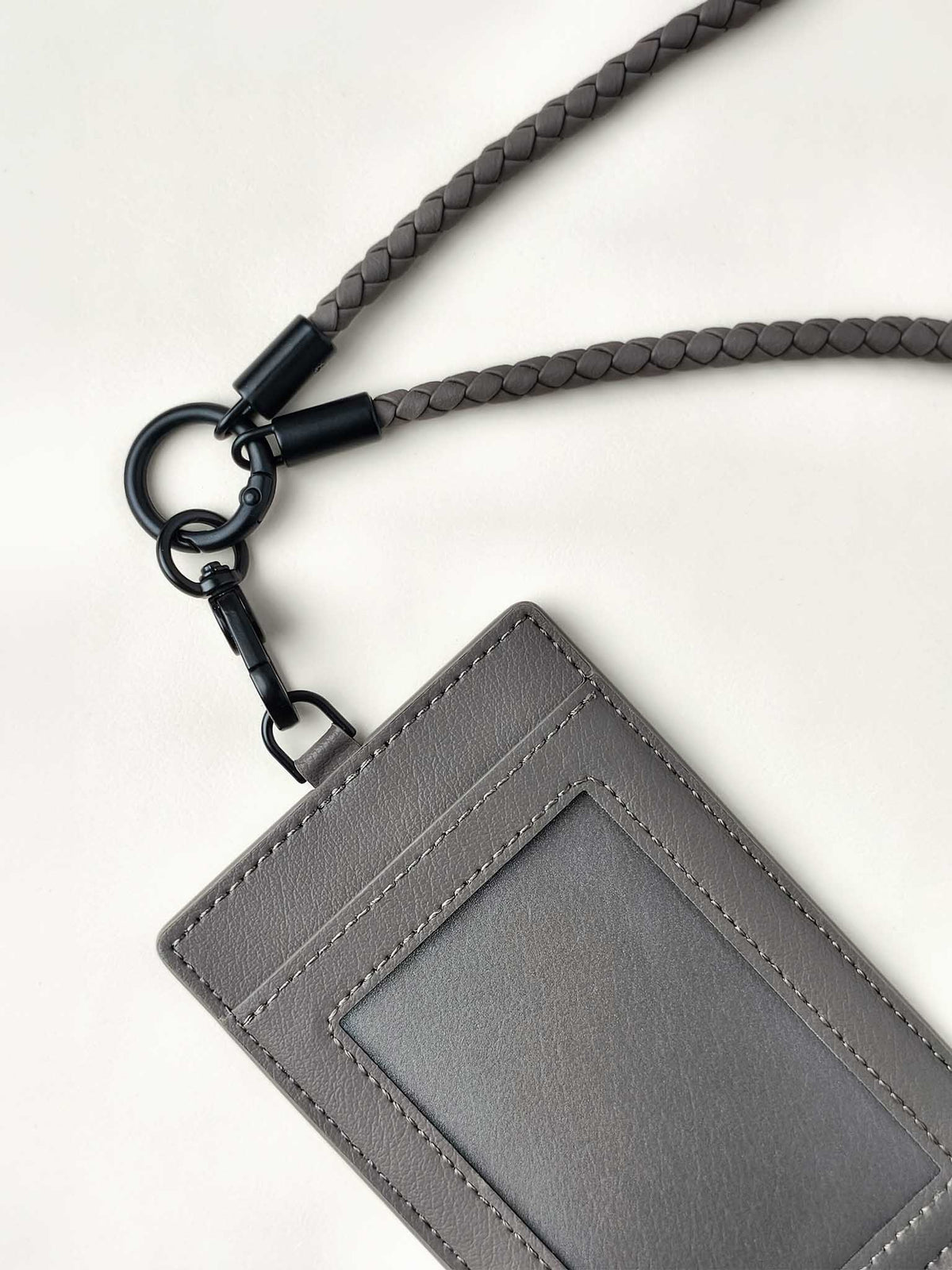 sicora vegan leather ID badge holder lanyard set in granite gray, close-up view