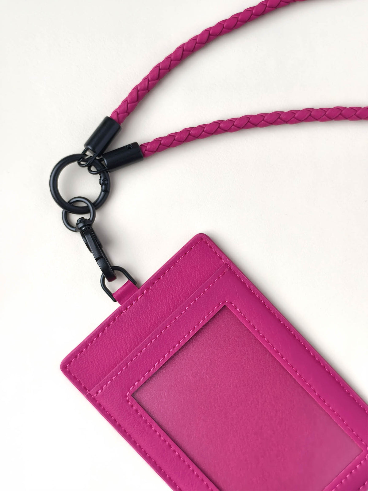 sicora vegan leather ID badge holder lanyard set in magenta, close-up view