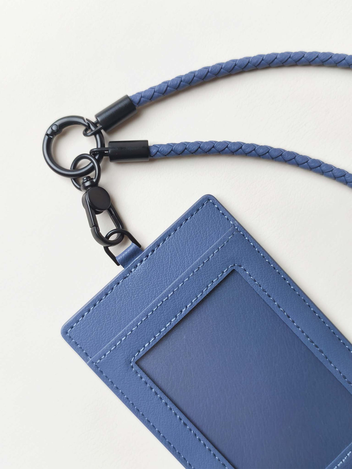 sicora vegan leather ID badge holder lanyard set in shadow blue, close-up view