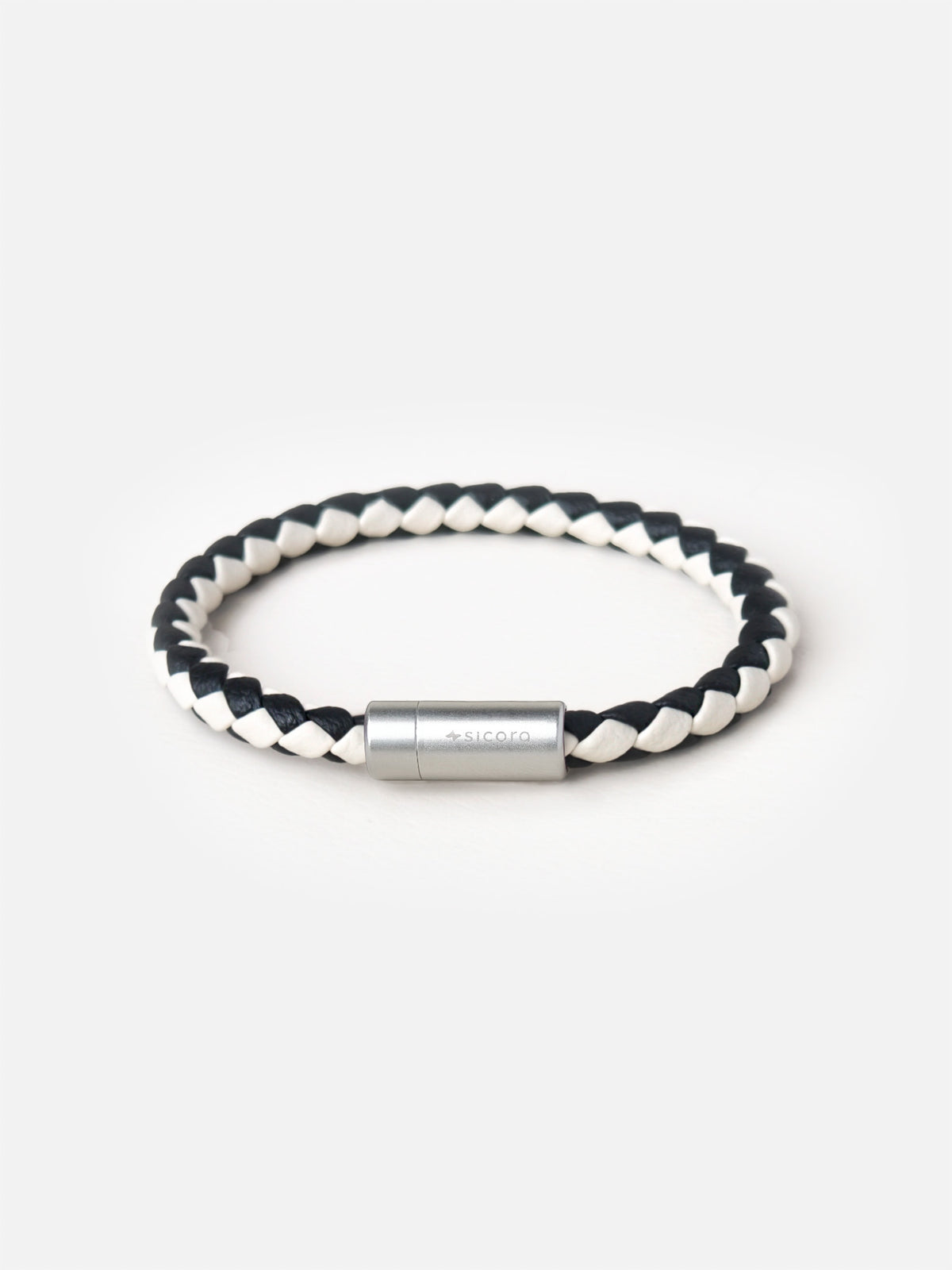 sicora cream and black duo-tone braided silio silicone vegan leather bracelet with a stainless steel metal magnetic clasp