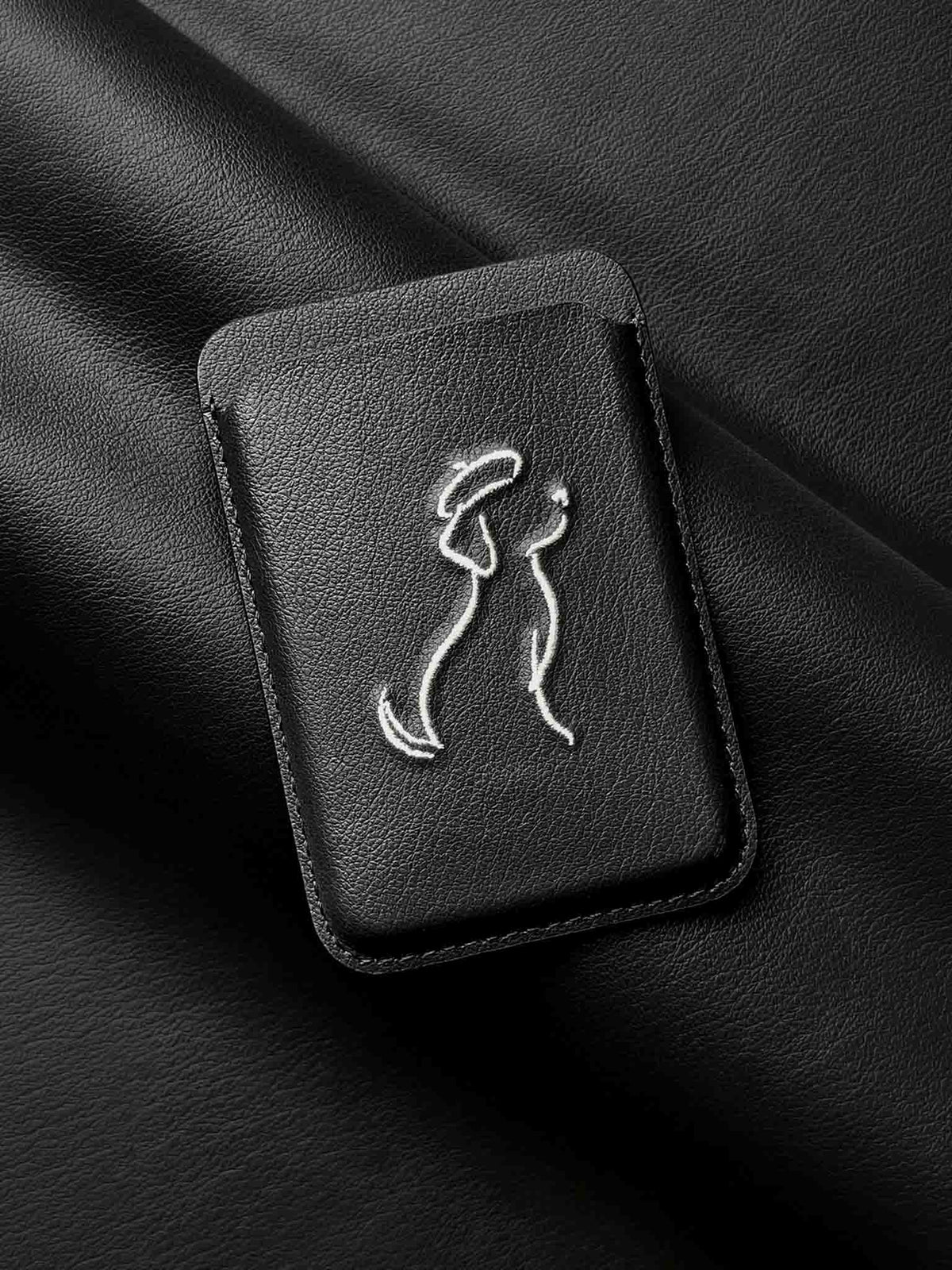 sicora vegan leather graphic magnetic card wallet in black with cream white embroidered dog line-drawing