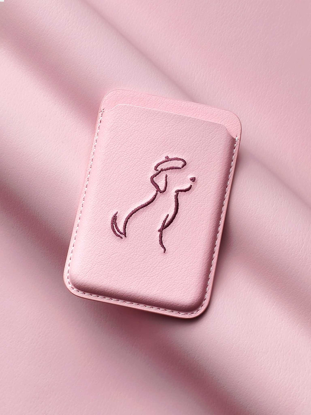 sicora vegan leather graphic magnetic card wallet in pink with dark burgundy embroidered dog line-drawing