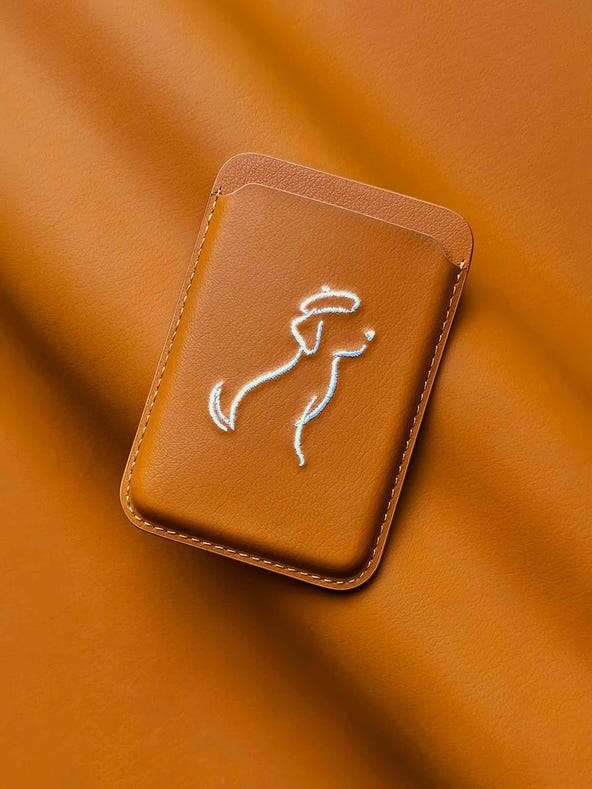 sicora vegan leather graphic magnetic card wallet in toffee gold brown with cream white embroidered dog line-drawing