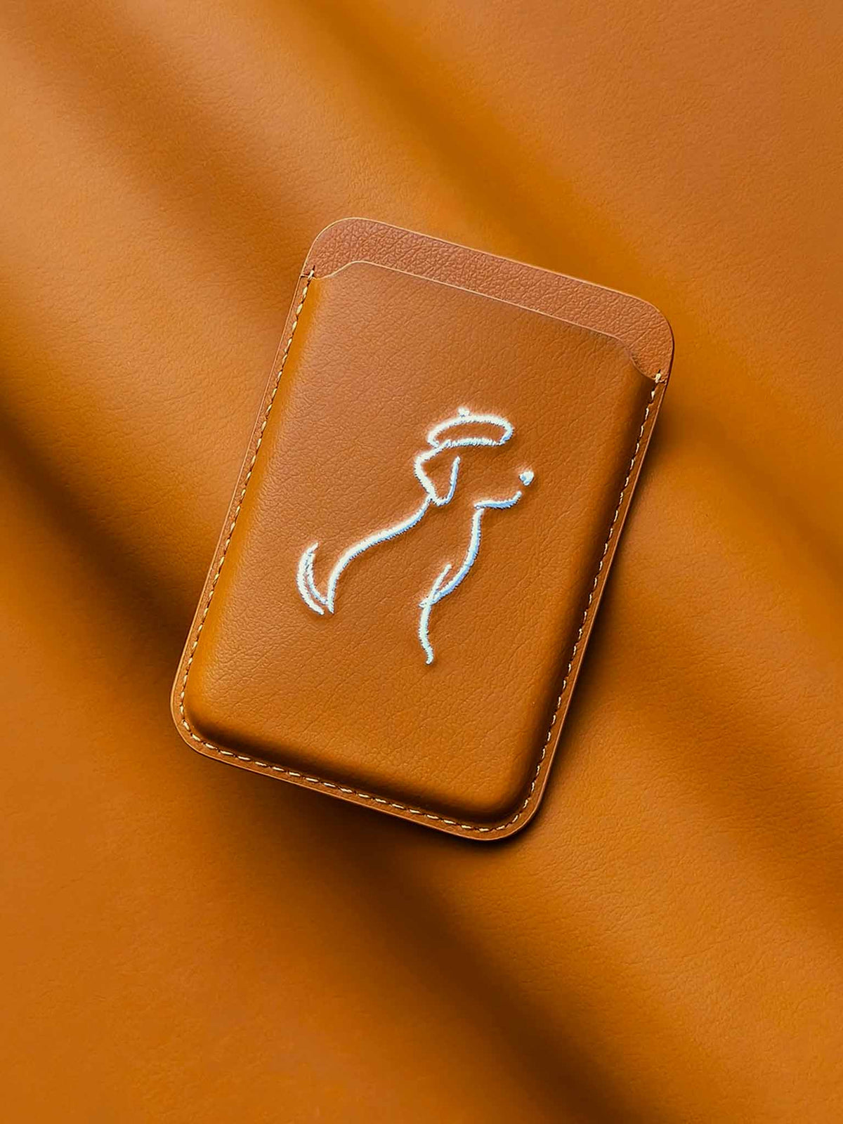 sicora vegan leather graphic magnetic card wallet in toffee gold brown with cream white embroidered dog line-drawing