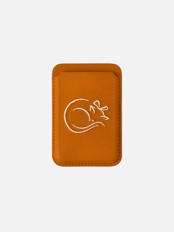 sicora vegan leather graphic magnetic card wallet in toffee gold brown with cream white embroidered cat line-drawing, front view
