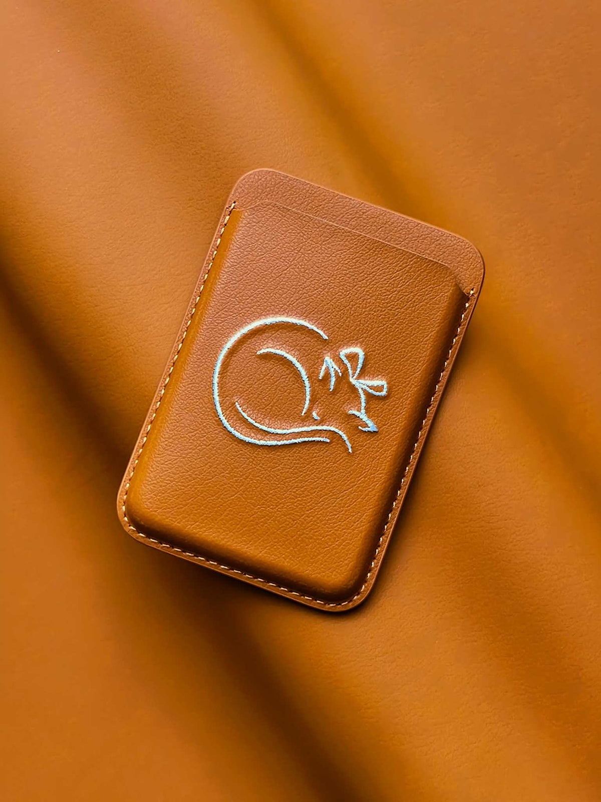 sicora vegan leather graphic magnetic card wallet in toffee gold brown with cream white embroidered cat line-drawing