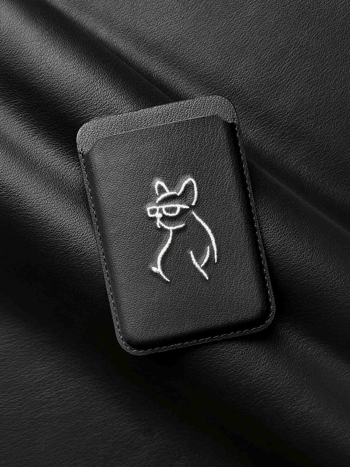 sicora vegan leather graphic magnetic card wallet in black with cream white embroidered dog line-drawing