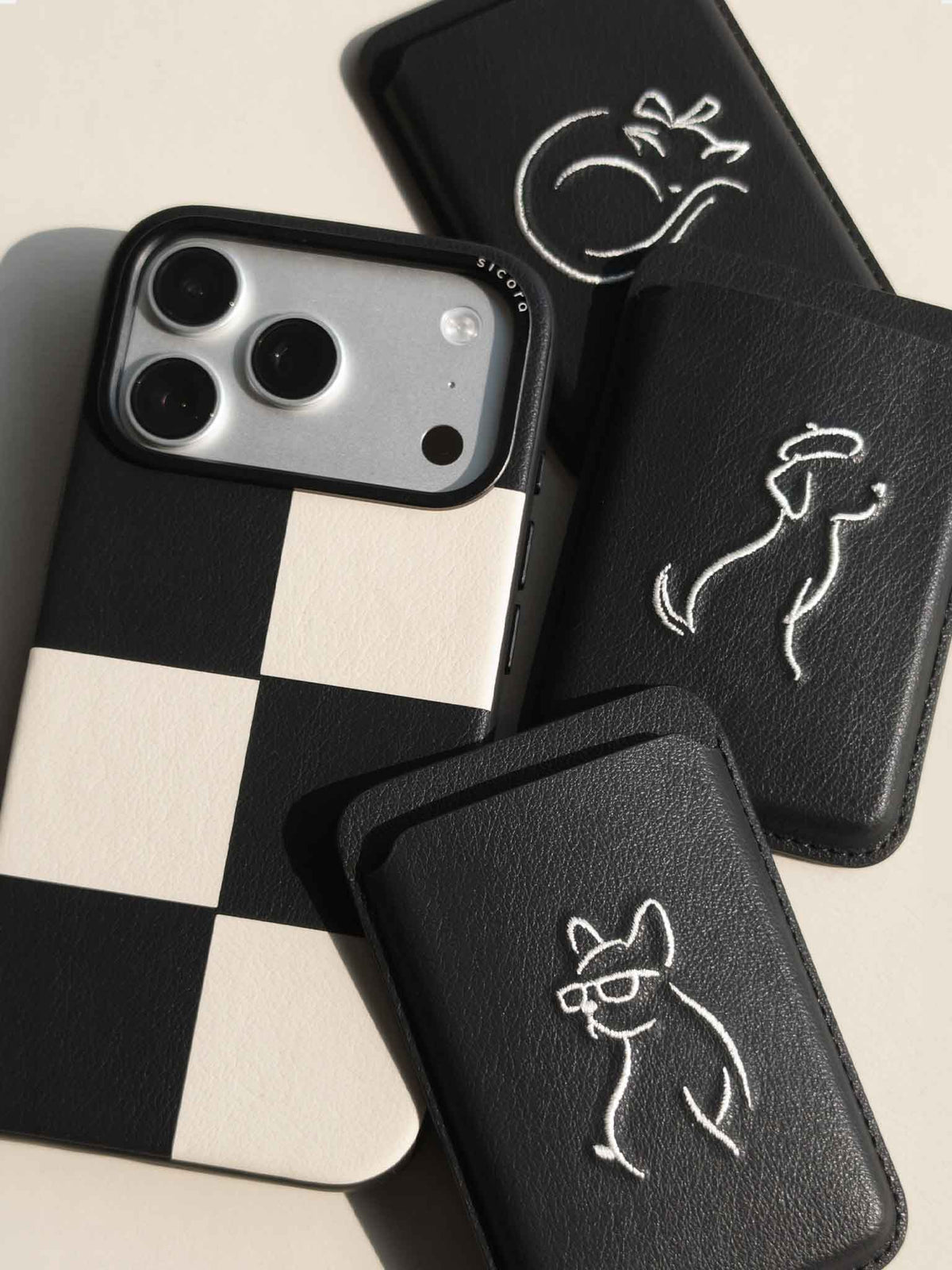 Flat-lays of black sicora vegan leather accessories: iPhone 18 / 17 pro case and magnetic card wallets