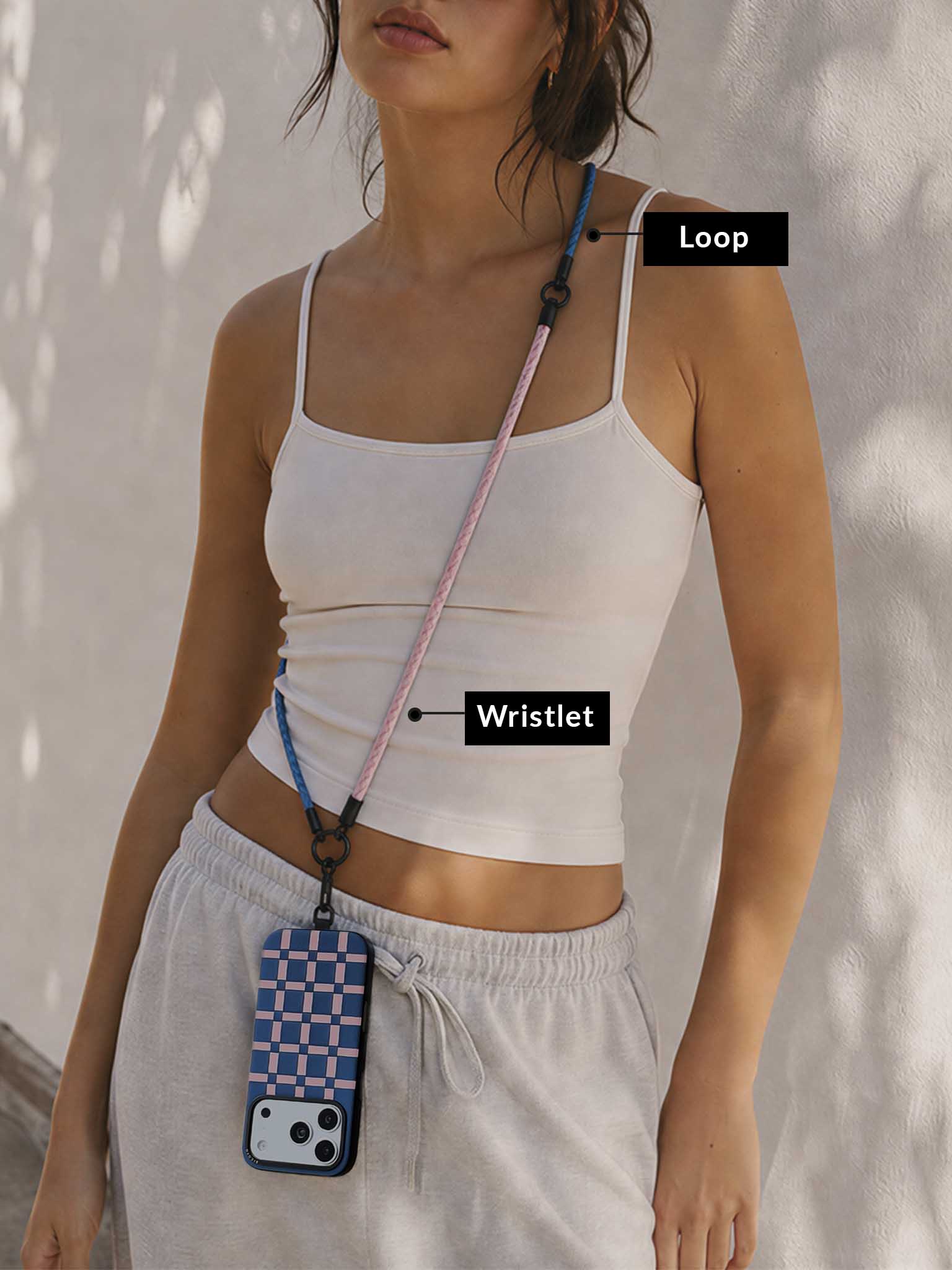 Sicora crossbody lanyard formed with pink wristlet and blue loop