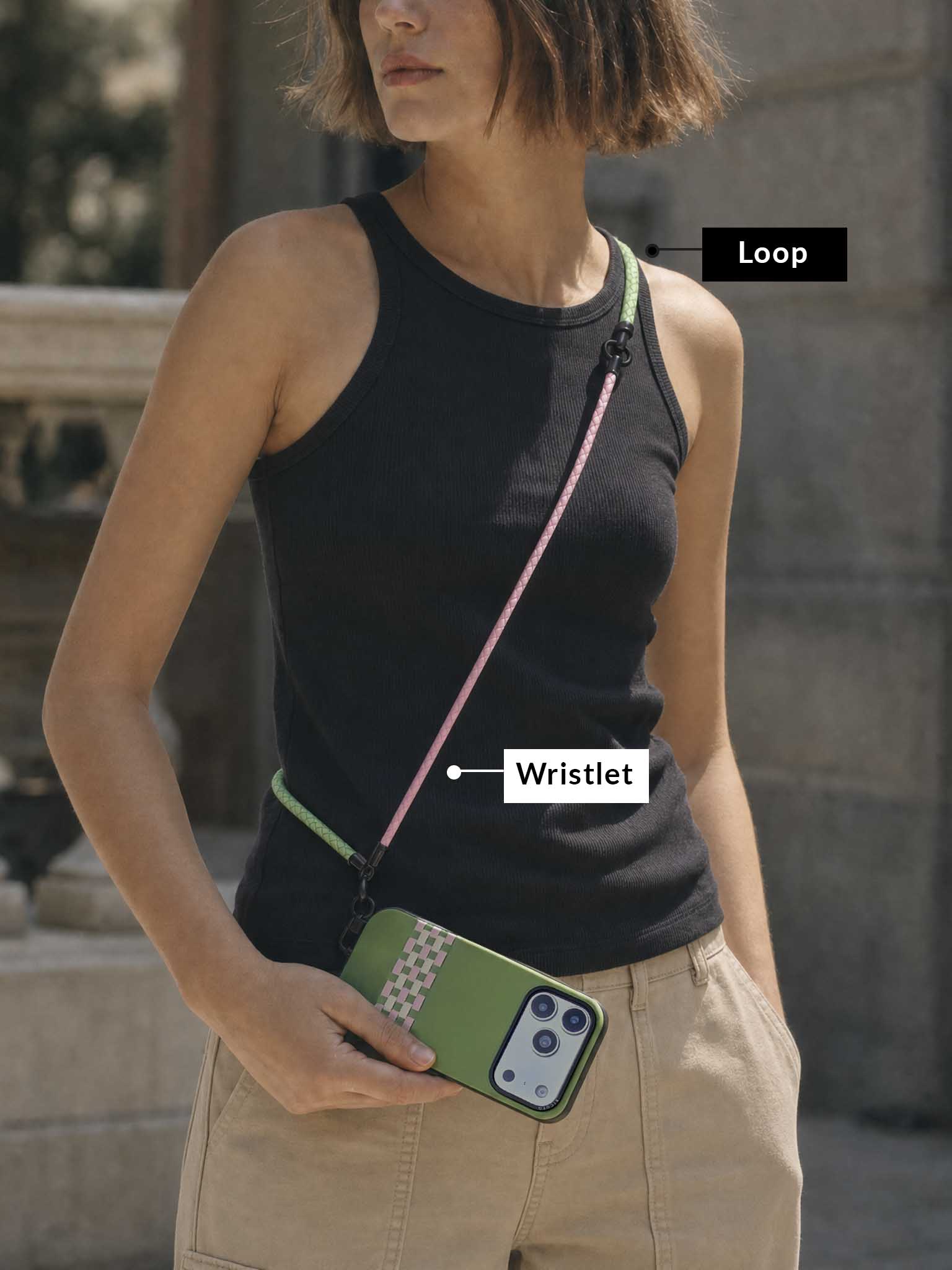 Sicora crossbody lanyard formed with pink wristlet and green loop