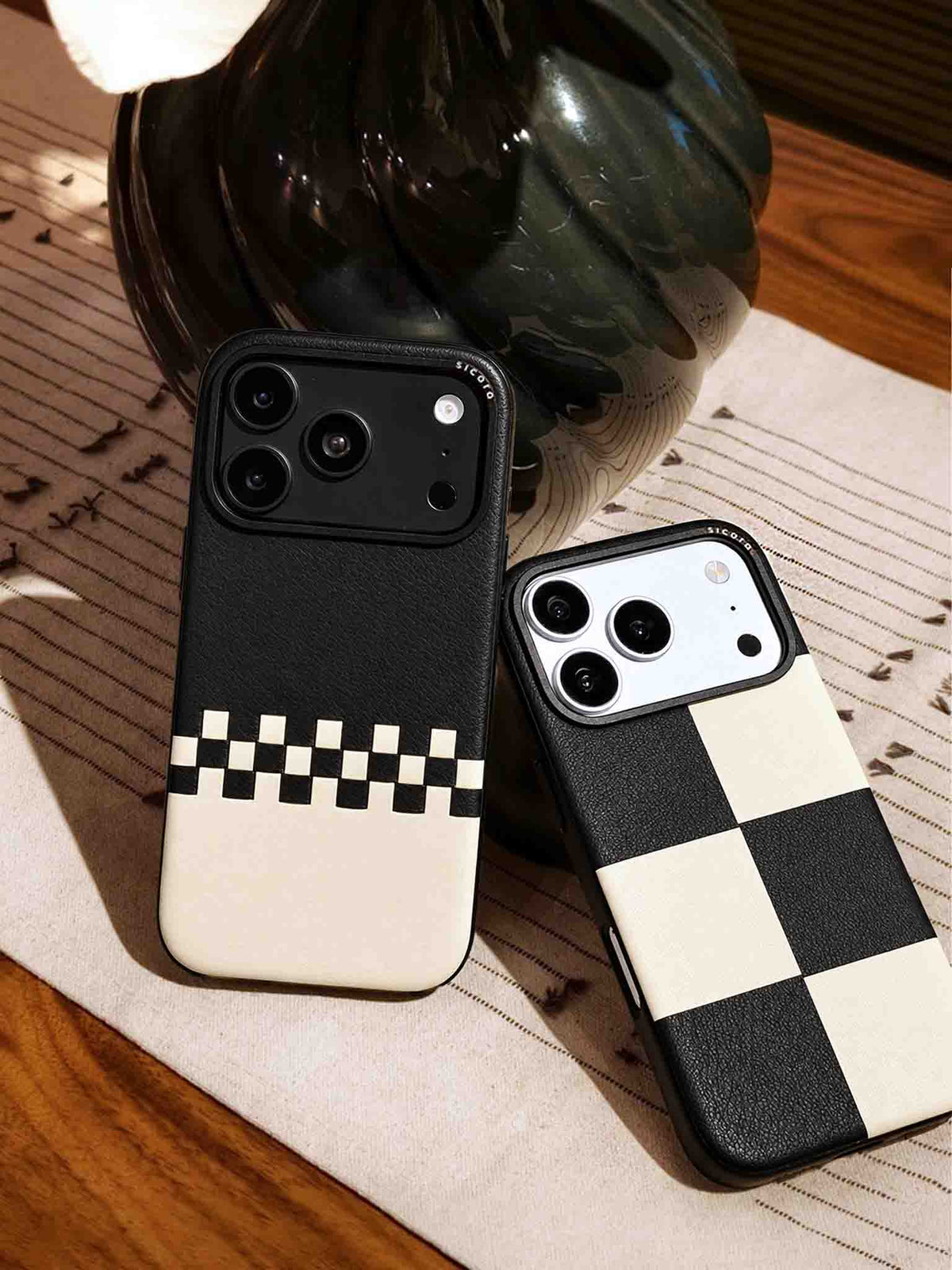Two sicora iPhone 18 / 17 pro vegan leather cases, bloom case and crossover case  in black and white combo