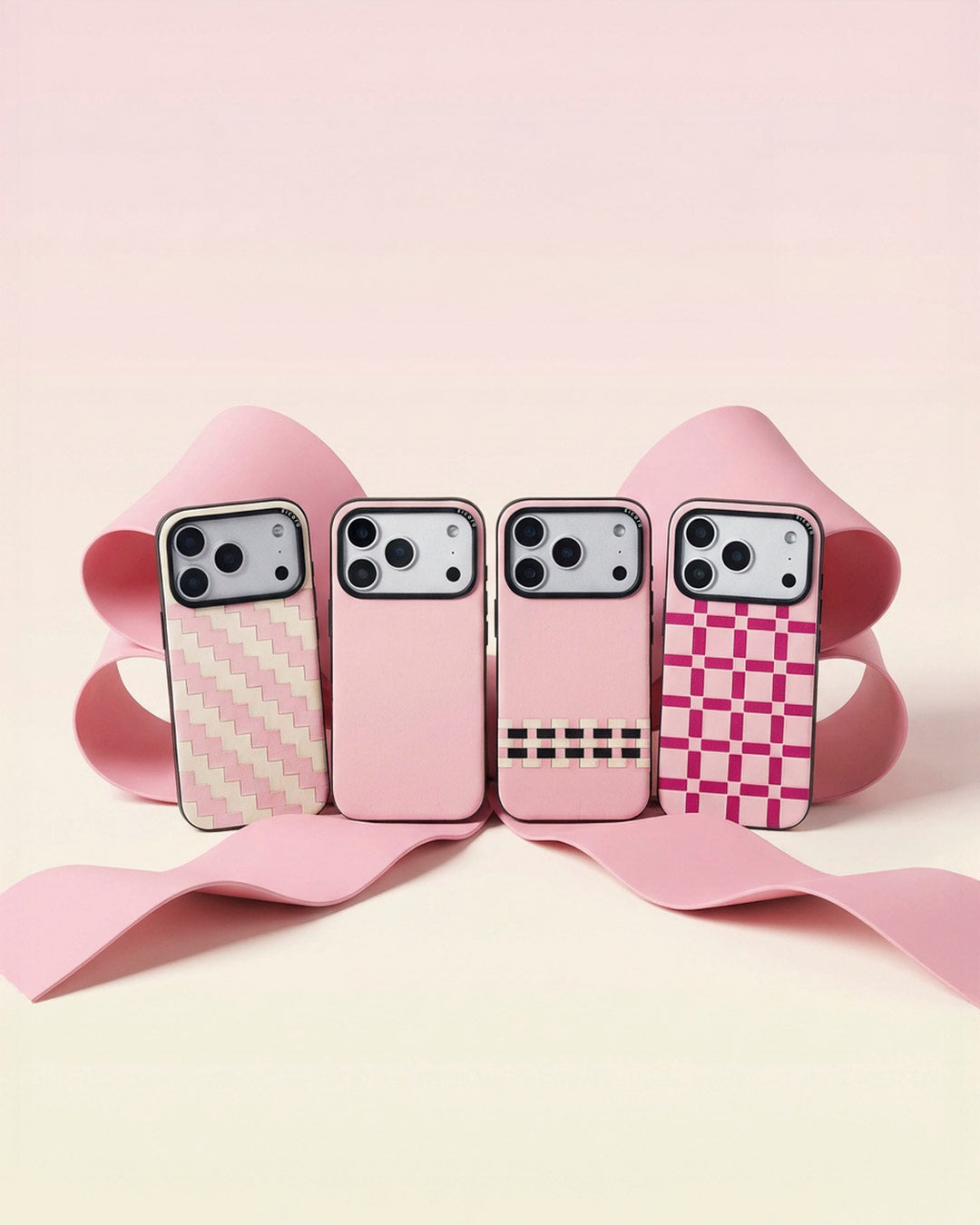 Four pink sicora leather phone cases on a light pink background