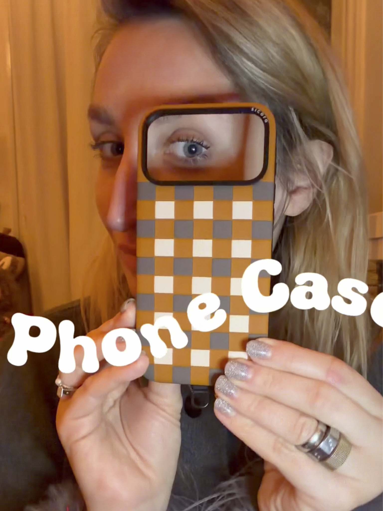 A KOL showcasing toffee brown gray sicora checkerboard iPhone case