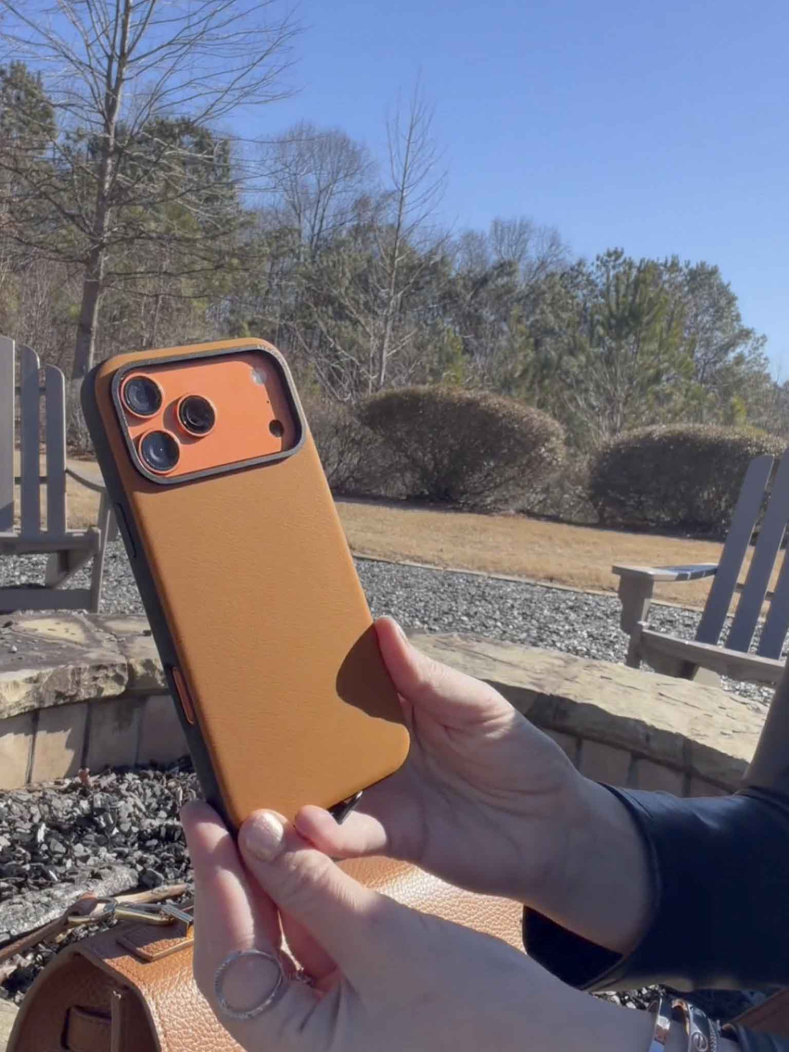 A KOL showcasing toffee brown sicora moodblock iPhone case