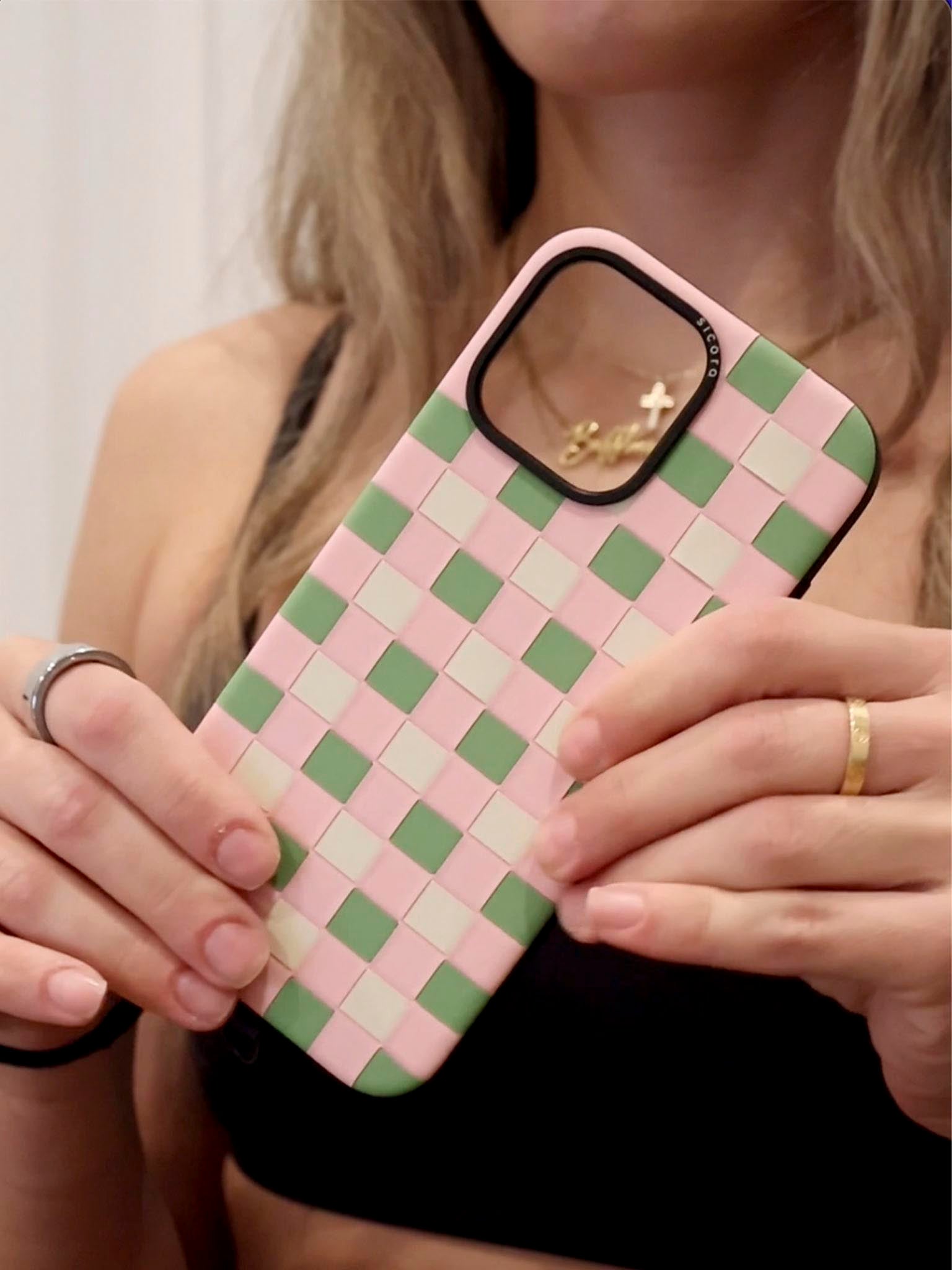 A KOL showcasing pink sicora checkerboard iPhone case 