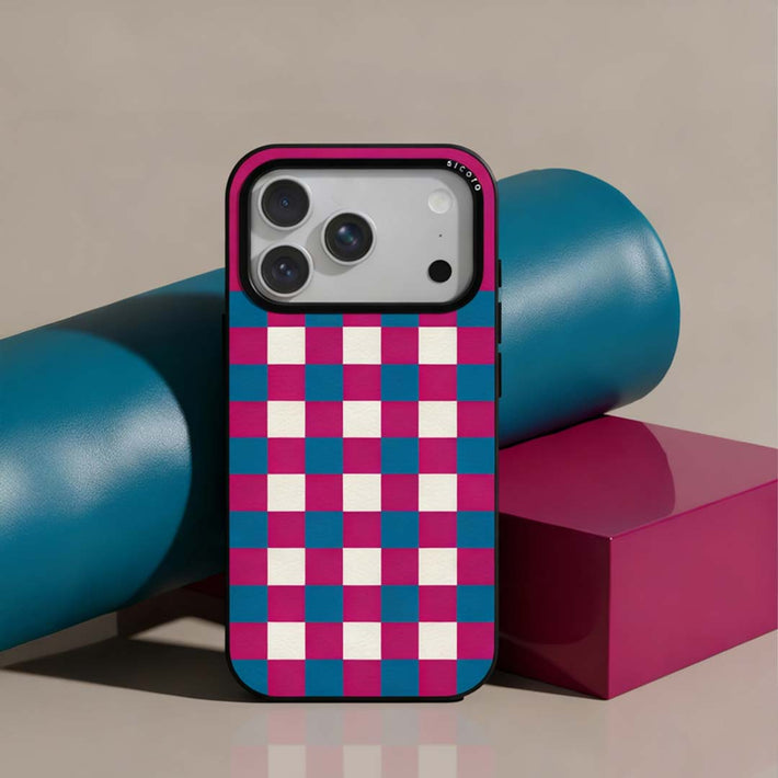 A sicora checkerboard iPhone case with magenta, sea blue and cream white checkered pattern in silio silicone vegan leather on a colorful background