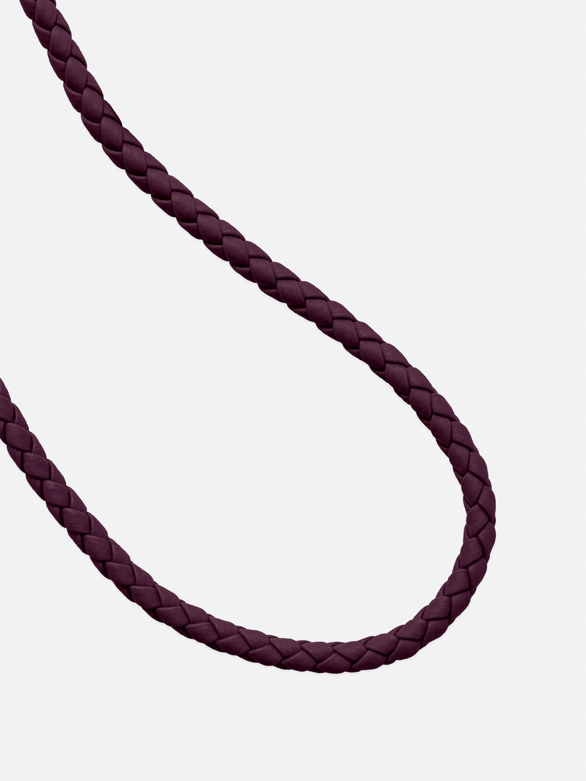Close-up of a sicora dark cherry purple braided leather cord / loop phone lanyard.