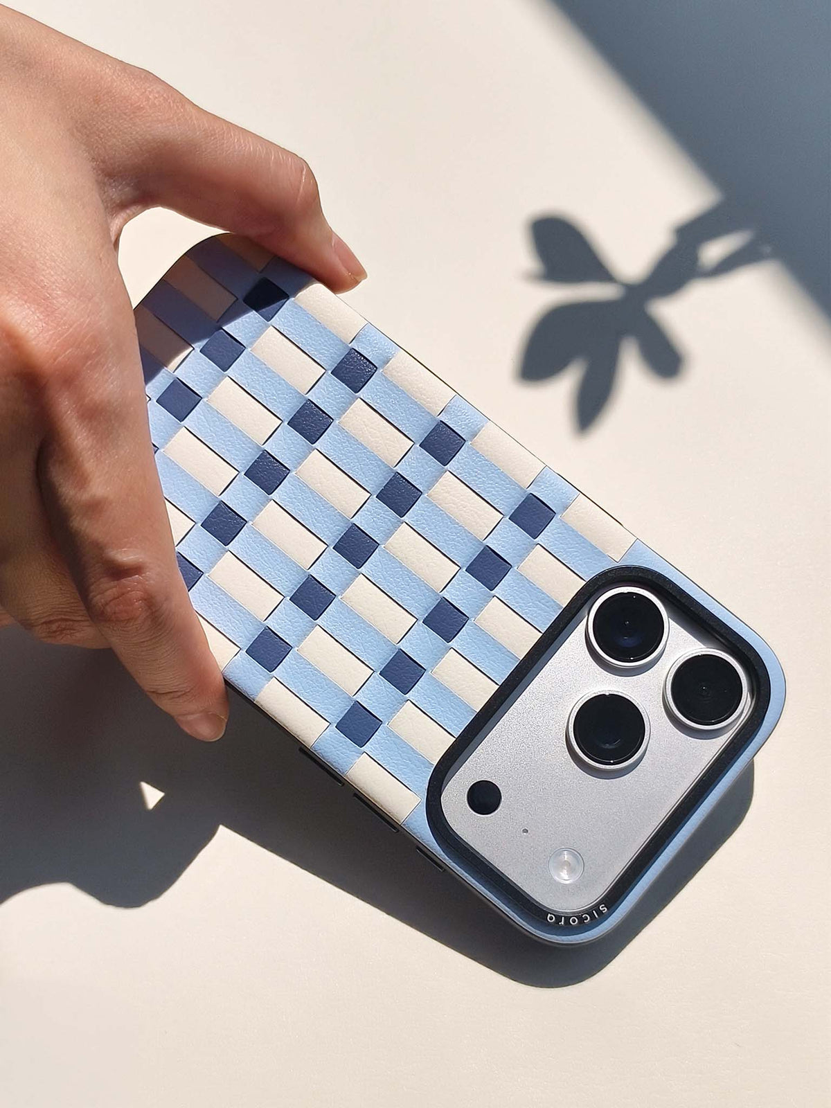 Product video showcasing sicora iPhone 18 pro vegan leather case, pixel case in sky, cream and shadow