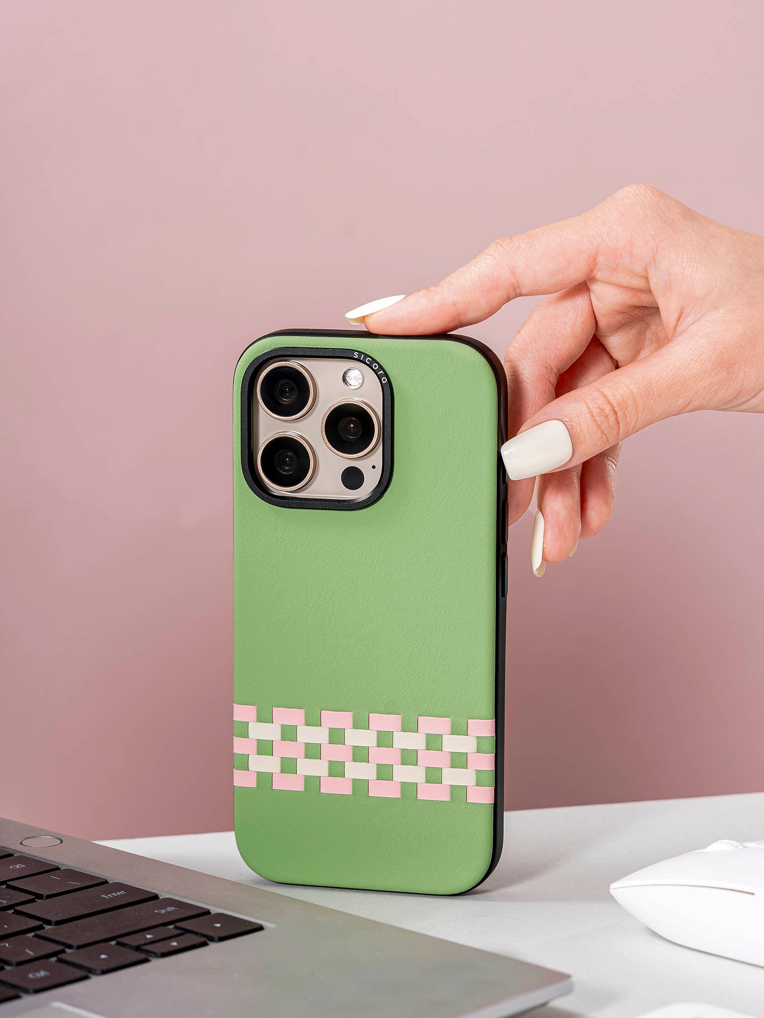 Fingers touching a sicora green pink white stitchon phone case