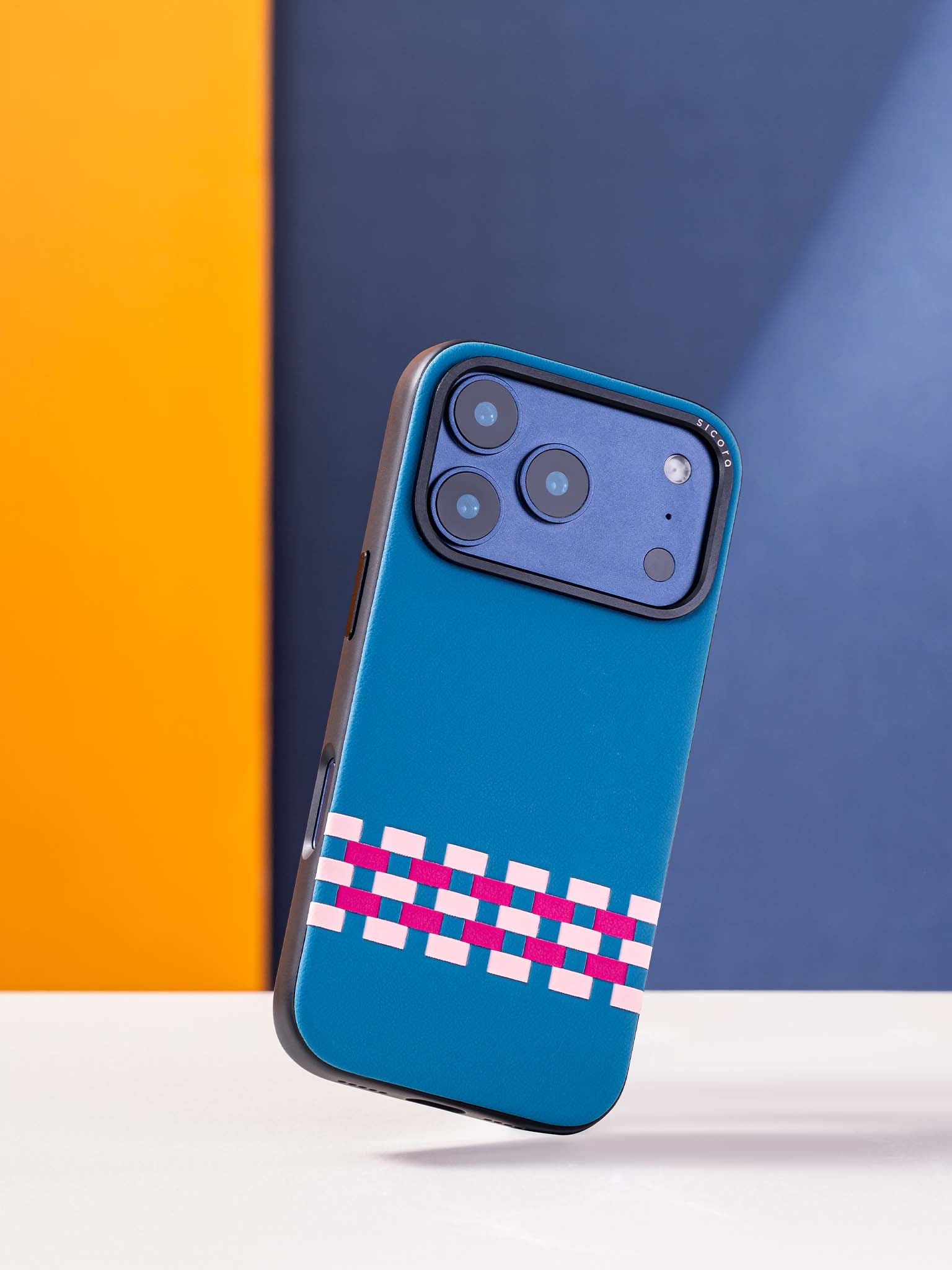Sicora stitchon phone case with sea blue, pink and magenta geometric pattern