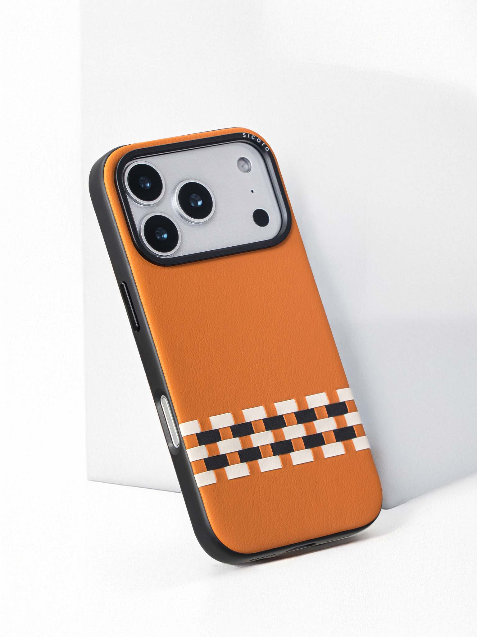 Sicora stitchon phone case with toffee gold, cream white and black geometric pattern