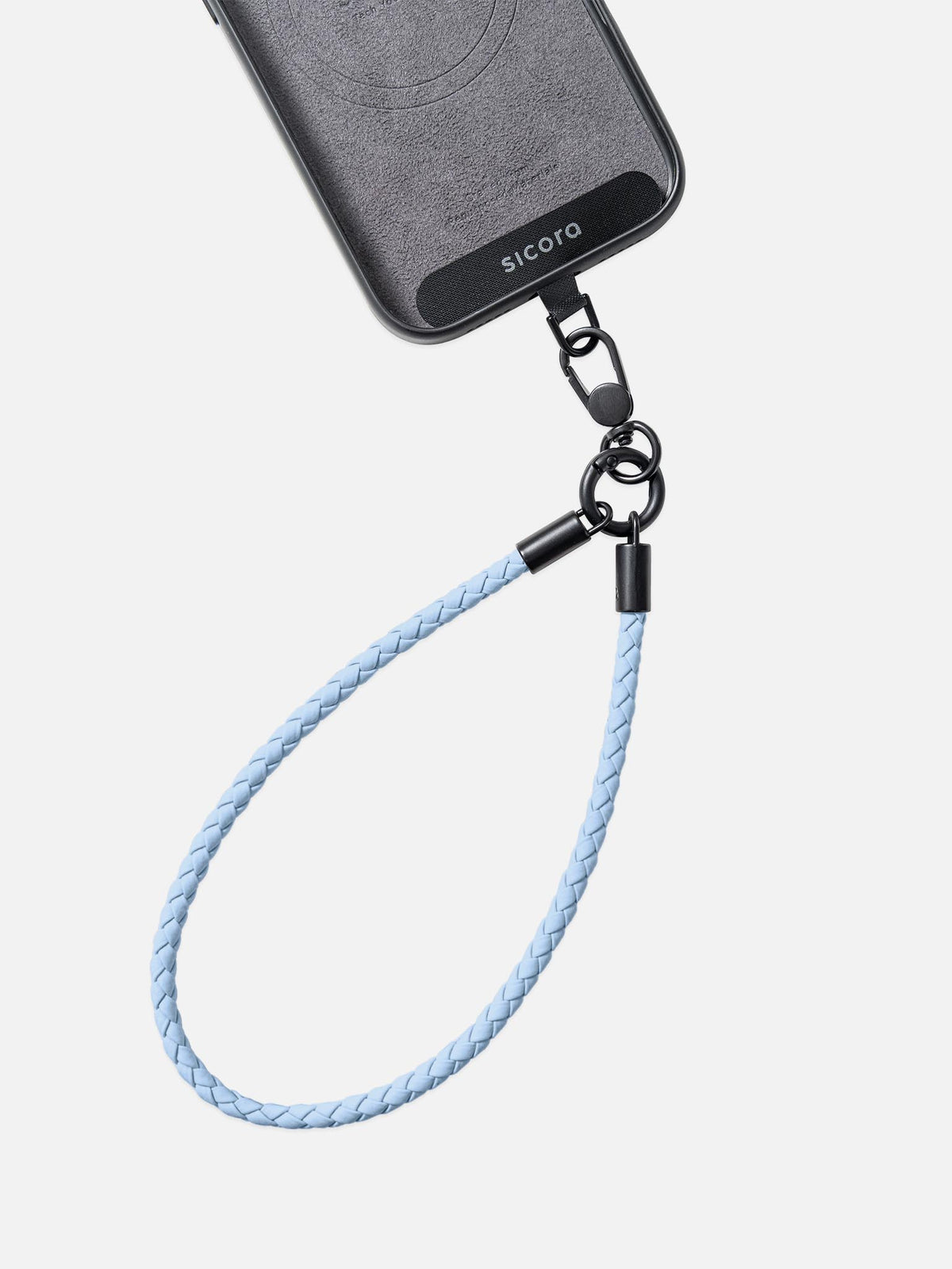 Close-up of a sicora light blue braided phone strap / wristlet attached to a sicora iphone case with a black metal clasp.