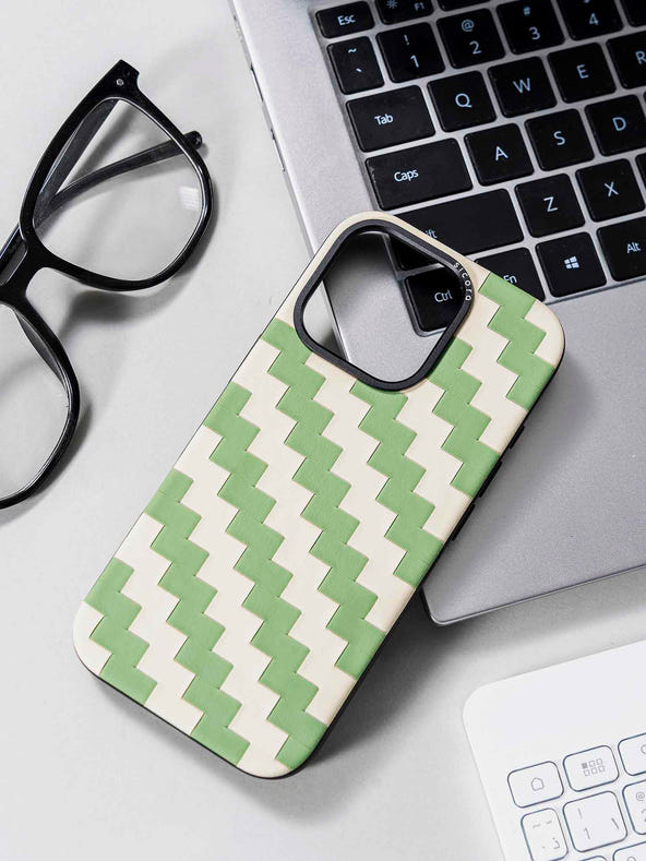 sicora green and white zigzag phone case on a desk