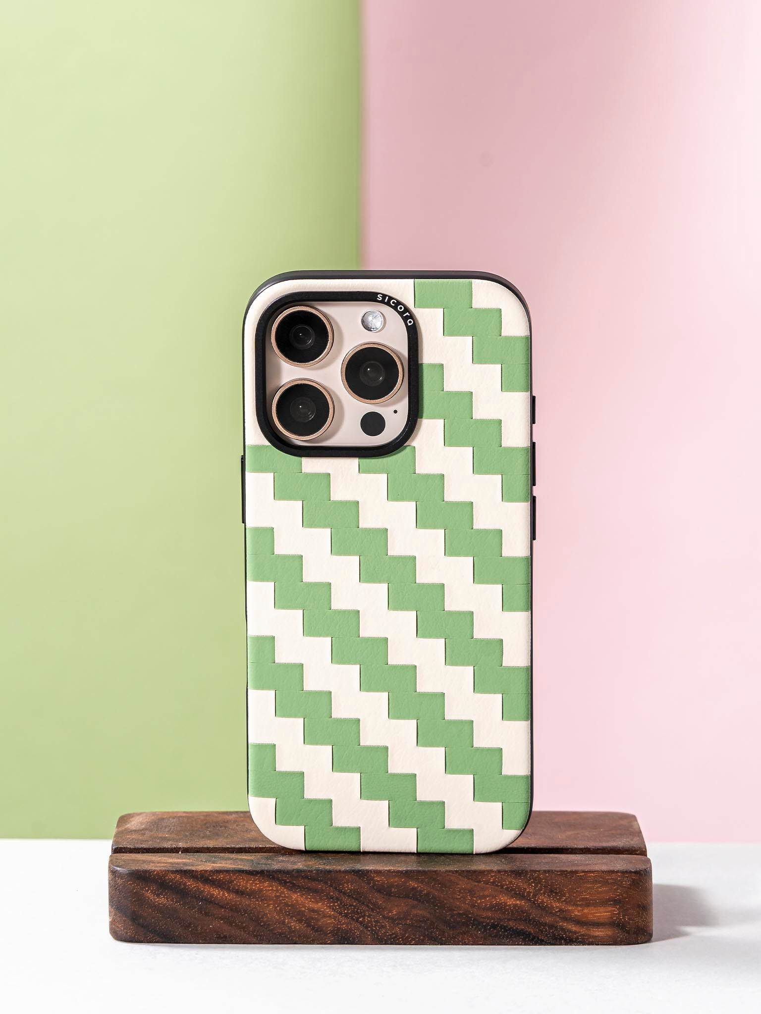 sicora green and white zigzag phone case on a stand